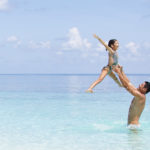 father and daughter on beach 1063x614 150x150 - superior-water-villa-1063x614