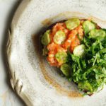 Leveldva_Hands_Grain Toast_ Poached Egg_ Salmon Tartare_ Light Kimchi Sauce