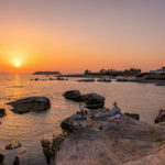 Champaign at Maniki Beach at Sunset